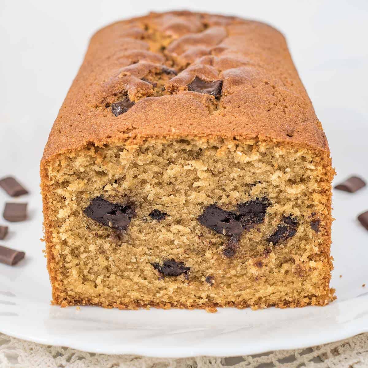 The front view of an instant coffee cake with a slice cut out.