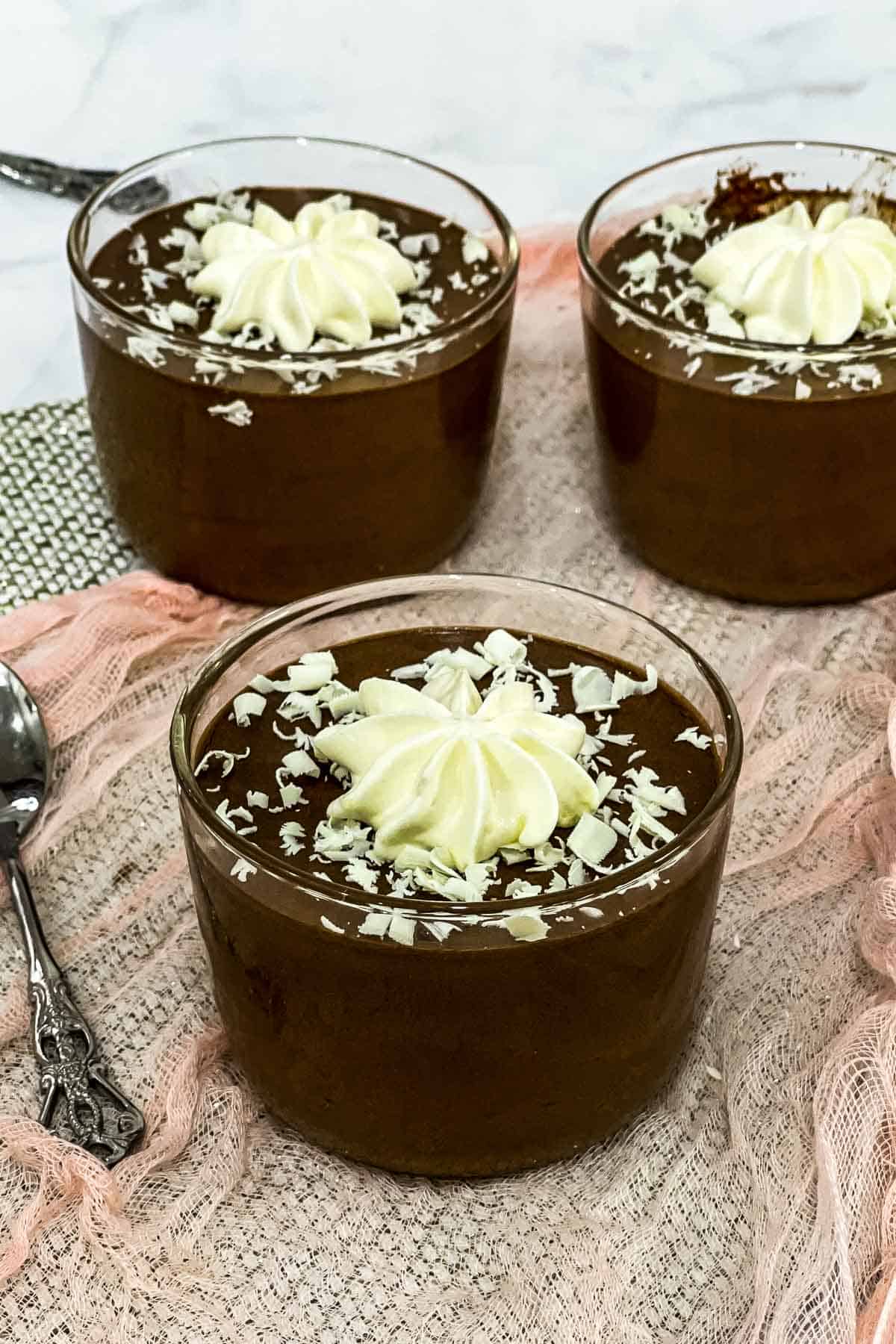 3 cups of mascarpone chocolate mousse with white chocolate topping.