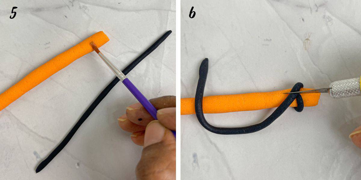 Brushing on an orange fondant strip, and wrapping a thin black fondant strip around orange fondant strip.