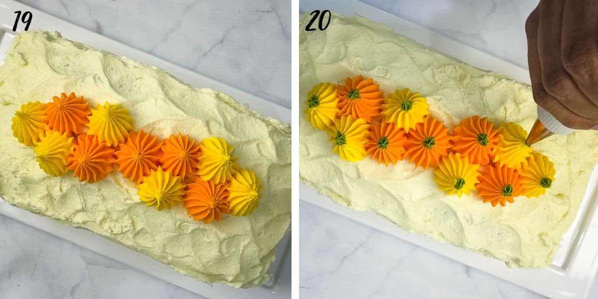 Orange and yellow piped pumpkins with green icing stems on a loaf cake.