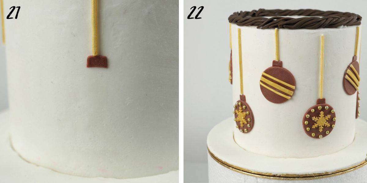 A gold line and maroon square on a white cake and baubles decoration on the side of a cake.