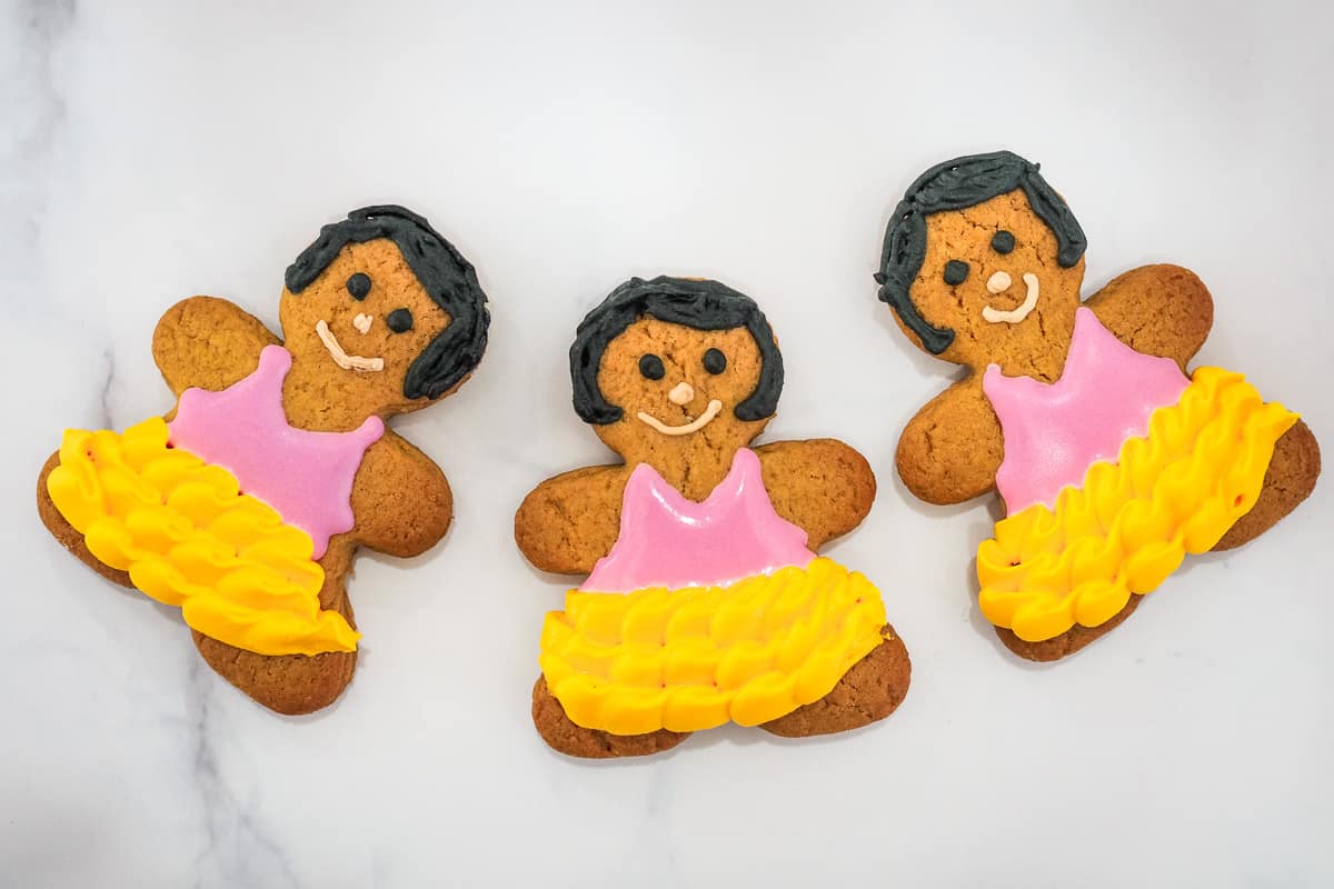 A row of gingerbread girl cookies.
