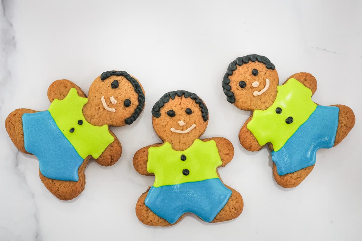A row of gingerbread boy cookies.