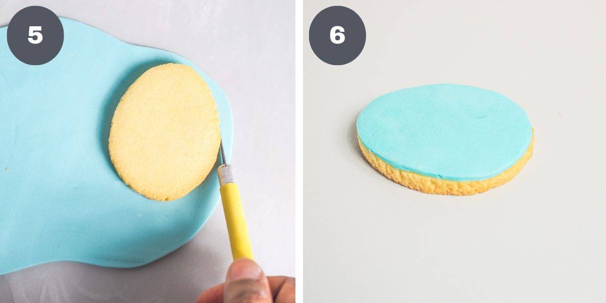 Cutting blue fondant following the outline of an egg shaped cookie.