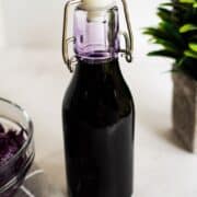 A bottle of purple ube syrup.