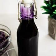 A bottle of purple ube syrup.