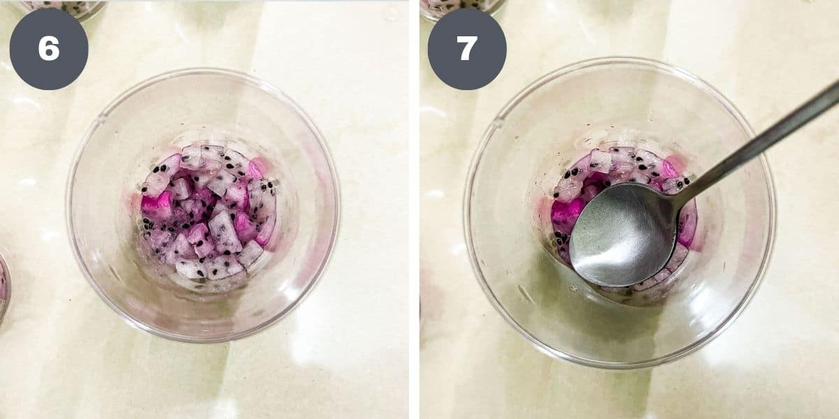 Cubed dragon fruits in a cup and using a spoon to press the dragon fruit in a cup.