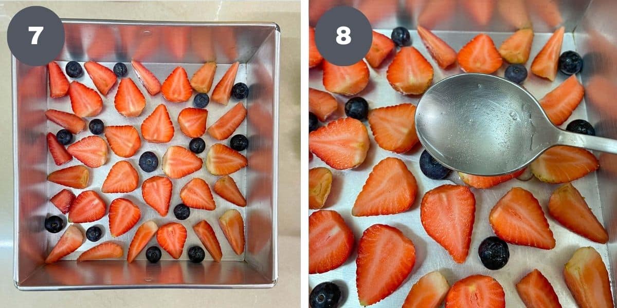 Cut strawberries arranged at the bottom of a square tin and pouring jelly into the tin.