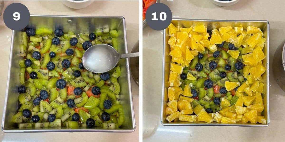Pouring jelly with a spoon into a square tin filled with fruits.